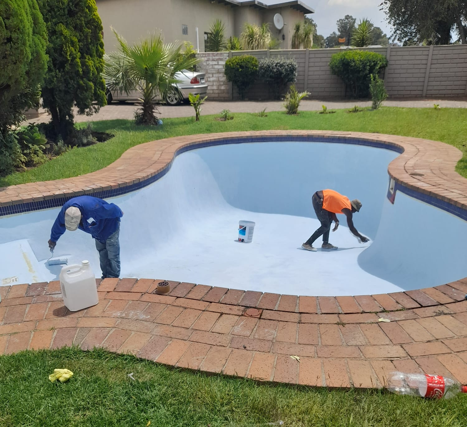 Satha Pool Services team working on a pool installation